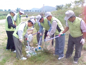 장성군지회, 황룡강변서 환경정화 활동